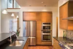 Beach & Coastal House Plan Kitchen Photo 07 - Juno Modern Home 011D-0266 - Search House Plans and More