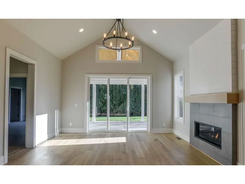 Shingle House Plan Family Room Photo 01 - Johnstone Bungalow Home 011D-0647 - Search House Plans and More