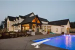 Modern Farmhouse Plan Rear Photo 05 - Asbury Park Luxury Home 011S-0196 - Search House Plans and More