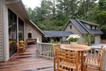 Rustic House Plan Deck Photo 01 - Hunnewell Point Rustic Home 082S-0004 - Search House Plans and More