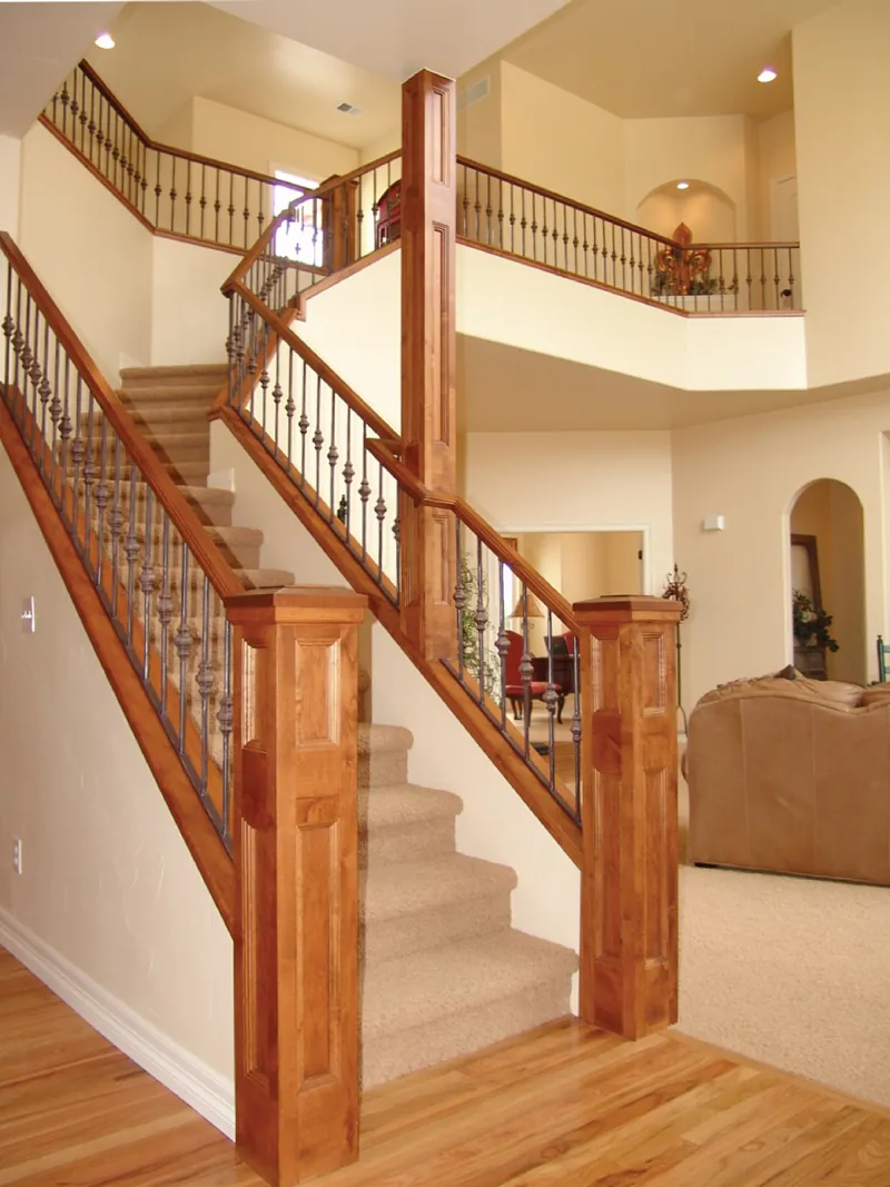 Unique staircase combines wood and iron.