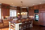 Country French House Plan Kitchen Photo 01 - Flora Park Country French Home 119D-0007 - Search House Plans and More